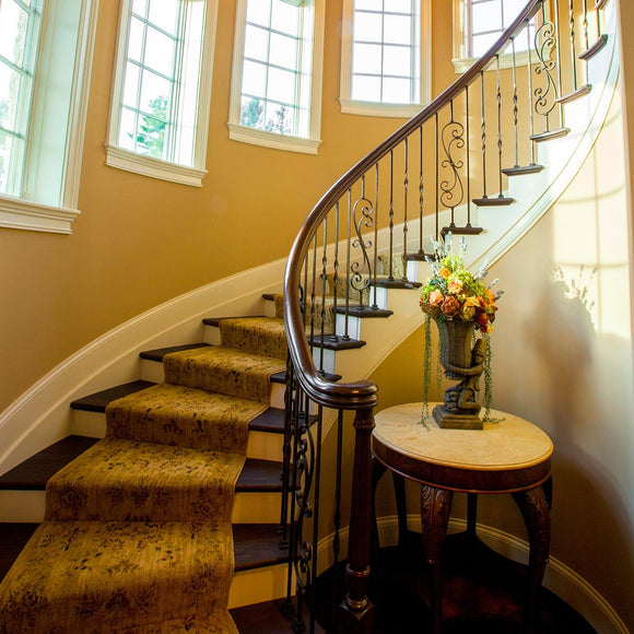 Spiral staircase in French Norman style residence. ©2013 Steve Ziegelmeyer