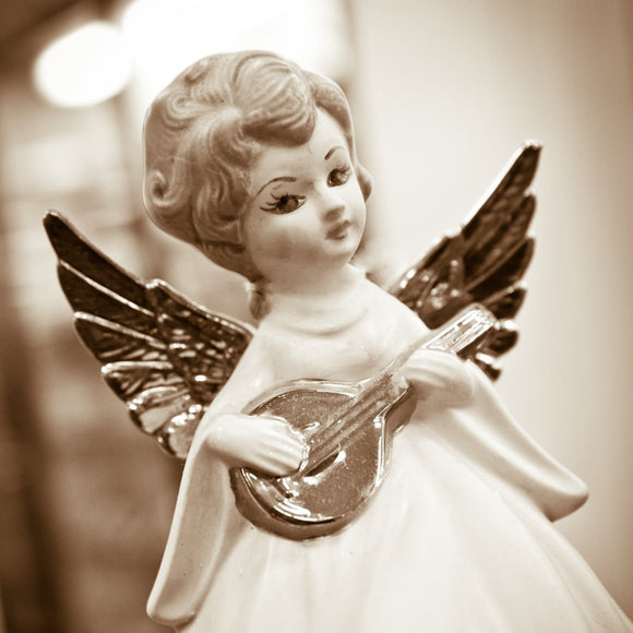 Ceramic Christmas angel with lute. ©2011 Steve Ziegelmeyer