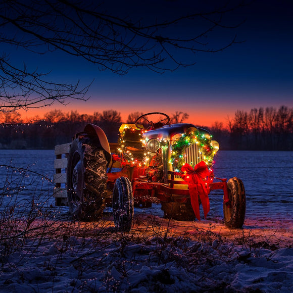 Christmas tractor in snowy field. ©2019 Steve Ziegelmeyer