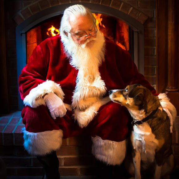 Santa Claus petting dog. ©2018 Steve Ziegelmeyer