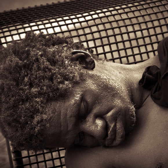 Sleeping on a park bench. Street portrait.  ©2014 Steve Ziegelmeyer