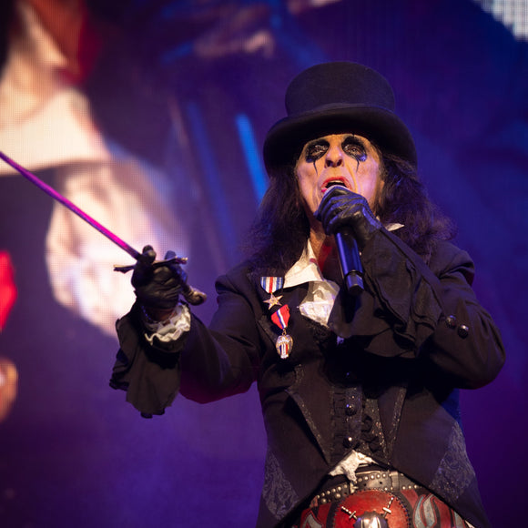 Alice Cooper performing live on stage.