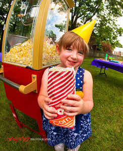 Girl with popcorn. ©2013 Steve Ziegelmeyer