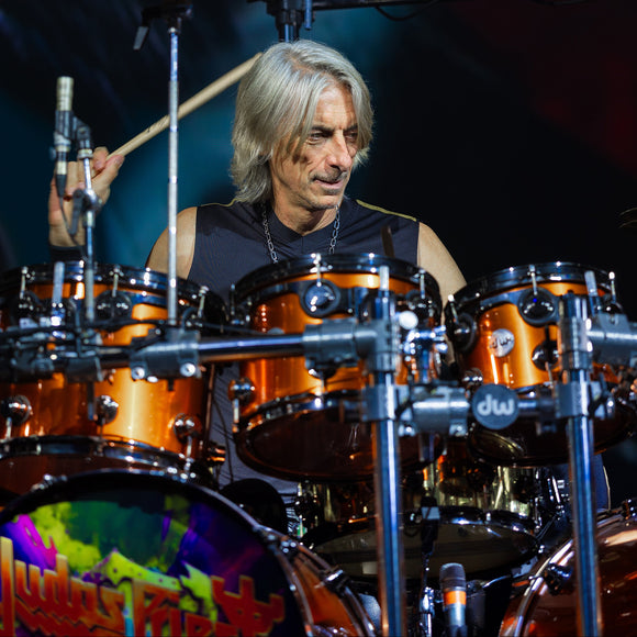 Drummer Scott Travis of Judas Priest performing live on stage.