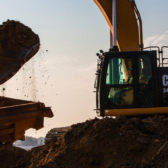 Backhoe excavating. ©2013 Steve Ziegelmeyer