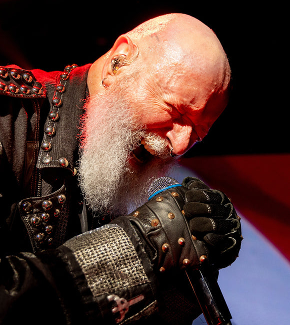 Singer Rob Halford of Judas Priest performing live on stage.