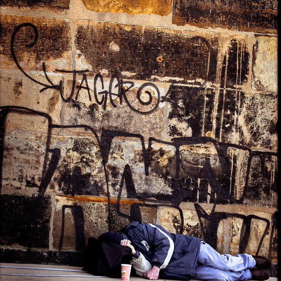 Sleeping on the bridge. Street portrait. ©2010 Steve Ziegelmeyer