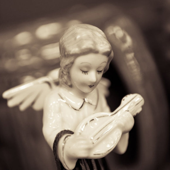 Ceramic angel with lute. ©2011 Steve Ziegelmeyer