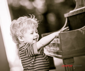 Evan on piano. ©2012 Steve Ziegelmeyer
