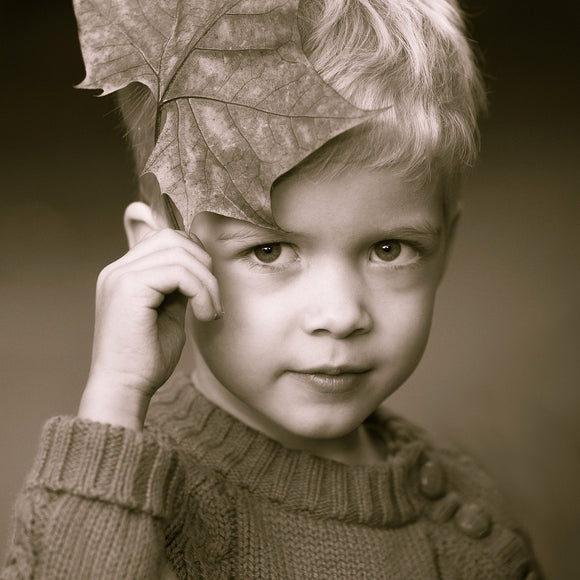 Boy with leaf. ©2014 Steve Ziegelmeyer