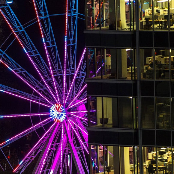 Skystar Ferris Wheel and downtown building. ©2018 Steve Ziegelmeyer