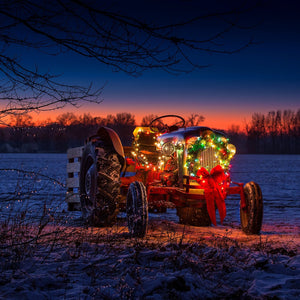 Christmas tractor in snowy field. ©2019 Steve Ziegelmeyer