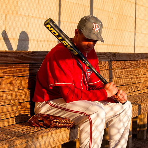 Baseball player in dugout. ©2013 Steve Ziegelmeyer