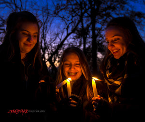 Sisters with candles. ©2017 Steve Ziegelmeyer