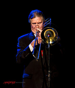 Lyle Lovett and his Large Band trombone player. ©2016 Steve Ziegelmeyer
