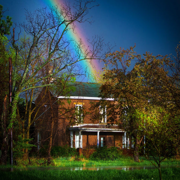 Rainbow over old farmhouse. ©2011 Steve Ziegelmeyer