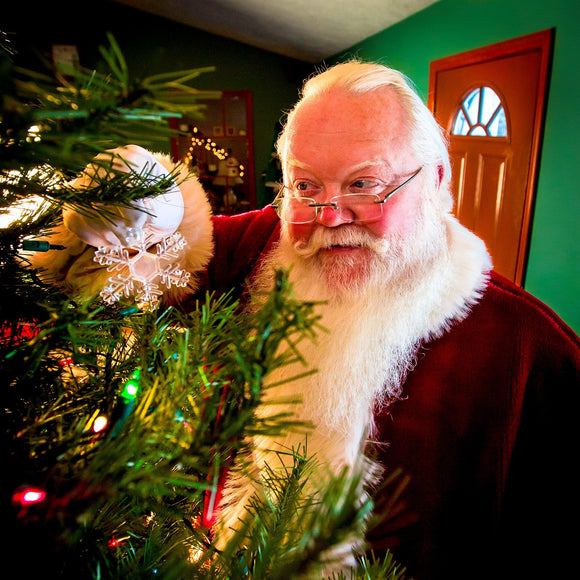 Santa Claus decorating tree. ©2017 Steve Ziegelmeyer