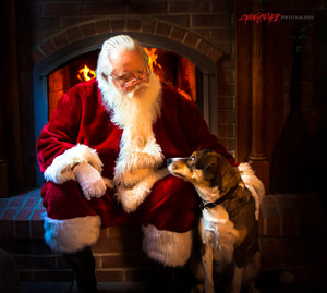 Santa Claus petting dog. ©2018 Steve Ziegelmeyer