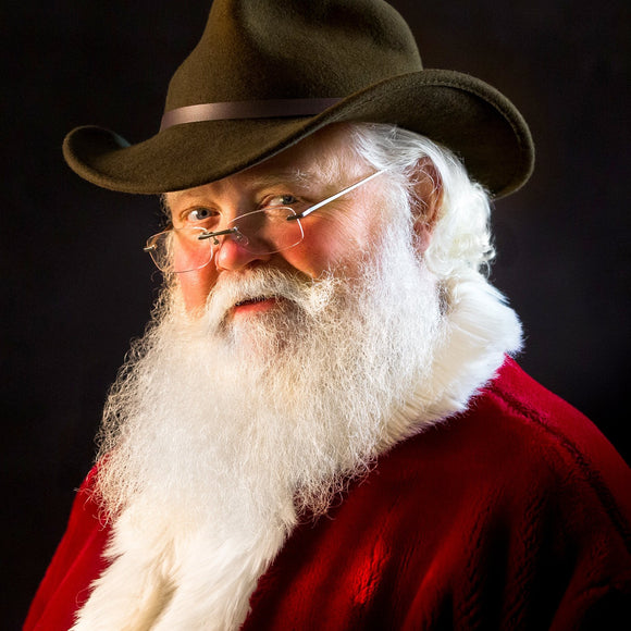 Santa Claus in cowboy hat. ©2018 Steve Ziegelmeyer