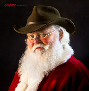 Santa Claus in cowboy hat. ©2018 Steve Ziegelmeyer