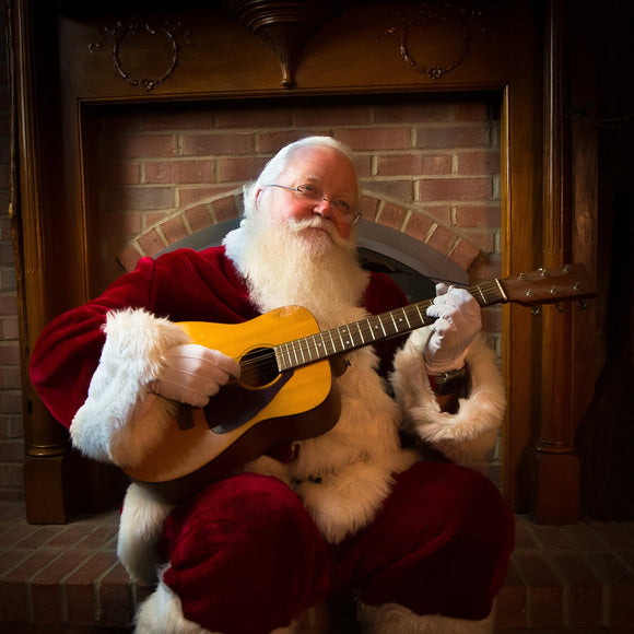 Santa Claus playing guitar. ©2018 Steve Ziegelmeyer