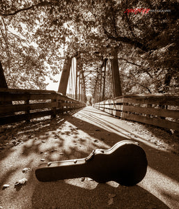 Guitar case on bridge. ©2018 Steve Ziegelmeyer