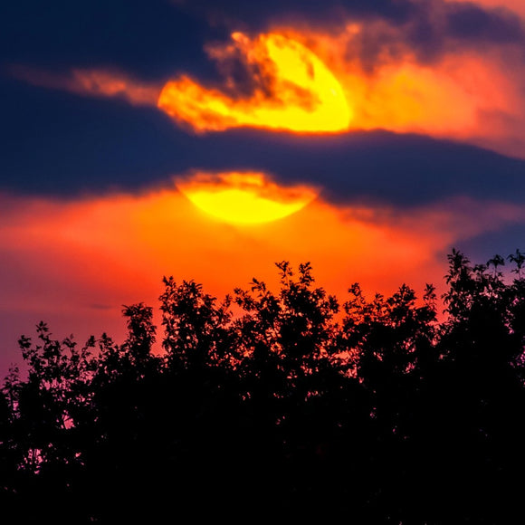 Sunrise through the clouds. ©2013 Steve Ziegelmeyer