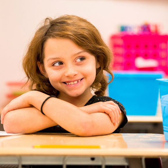 Smiling girl in class. ©2019 Steve Ziegelmeyer