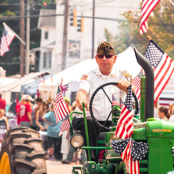 Veteran on tractor in parade. ©2015 Steve Ziegelmeyer